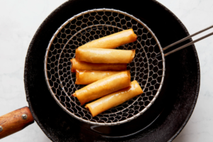 Freshly cooked lumpia out of the frying pan